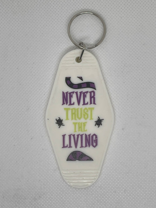 Never Trust Living Purple Keychain